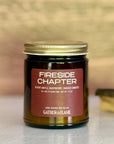 Candle jar labeled 'Fireside Chapter' by Gather in Flame on a neutral background