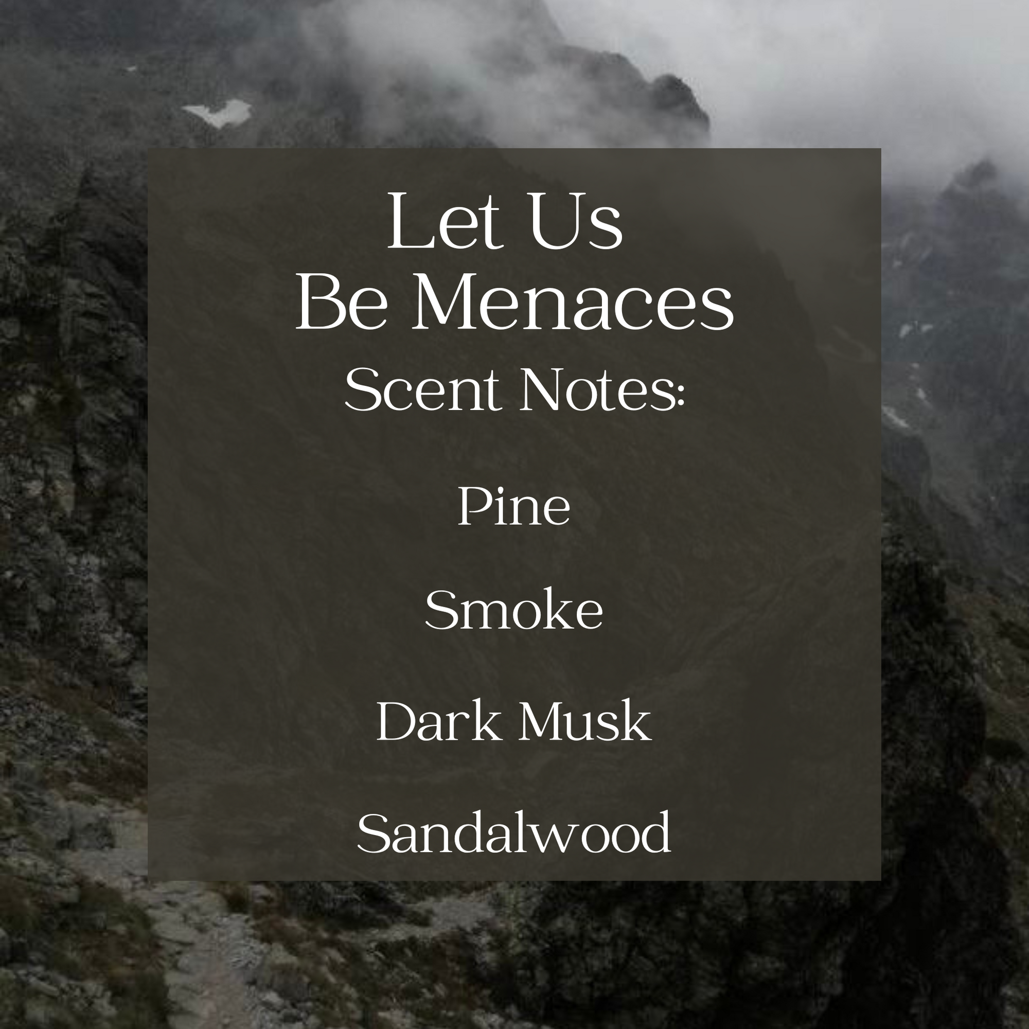 text with the scent notes of the Let Us Be Menaces candle with a foggy mountain range in the background